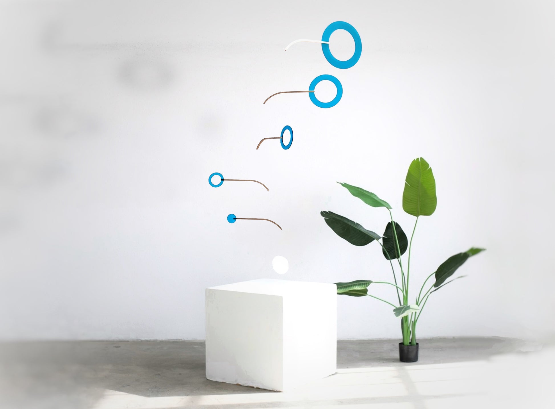 Teal Kinetic Hanging Mobile Sculpture, Minimalistic Circles Adult Mobile Home Decor - Halo Halo Handcrafted By The Illuminist
Introducing Halo Halo Mobile - A stunning piece of kinetic art that will bring movement and interest to any room. Handcrafted from responsibly sourced engineered birch, this unique mobile features six halo rings of increasing width and size in frosted Orange acrylic. Similar to my original Halo mobile but on a verticle plane.