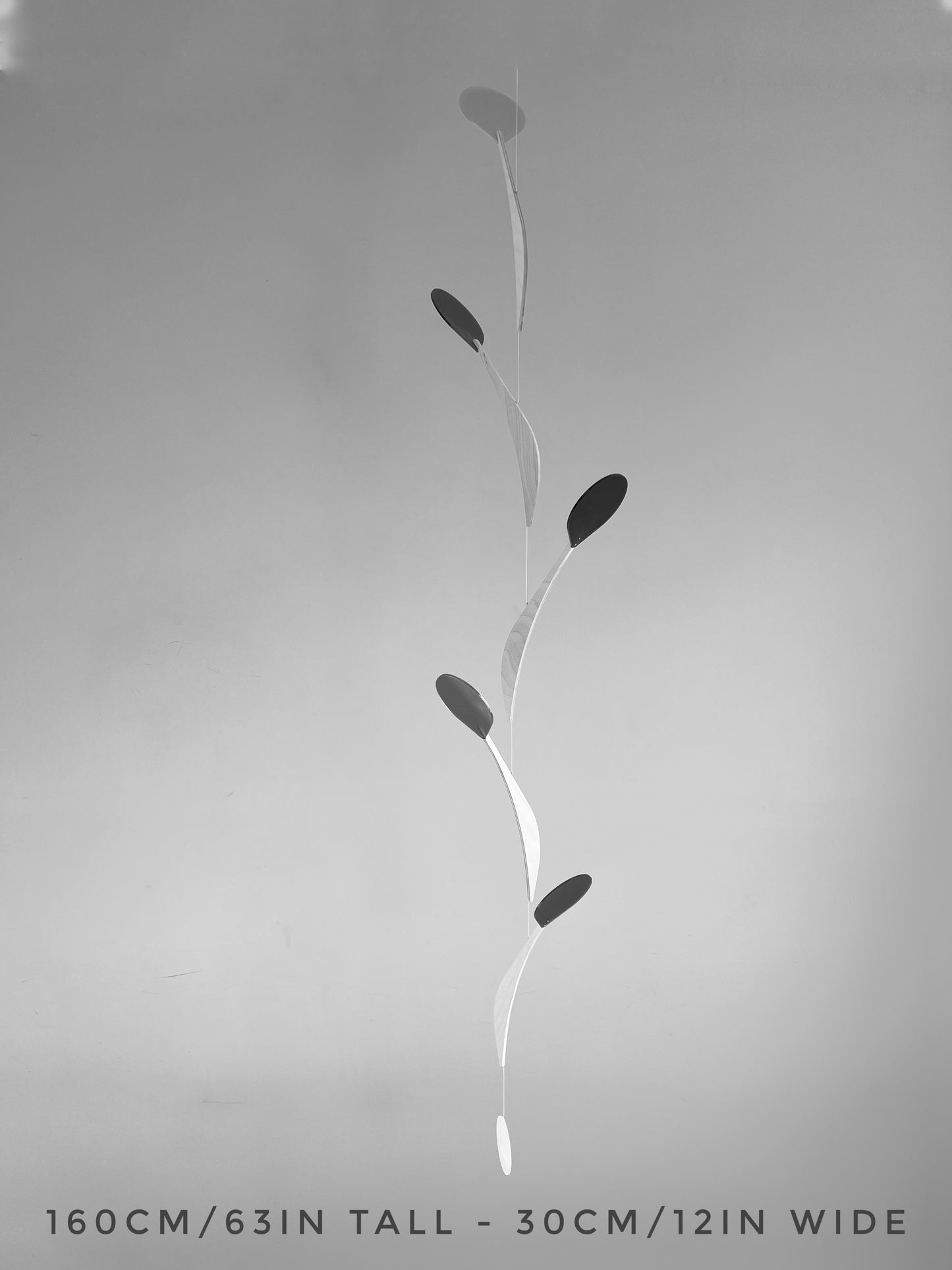 Modern Kinetic Mobile Art - Wall Hanging Relaxing Decor for Scandinavian Home Design, Office Spaces, Waiting Rooms & Minimalist Yoga Studio
Introducing Vine, a kinetic mobile inspired by the graceful climb of vines. This sleek, tall & slender mobile brings movement and calm to any space, whether it's a mid-century modern living room, a yoga studio or an office.