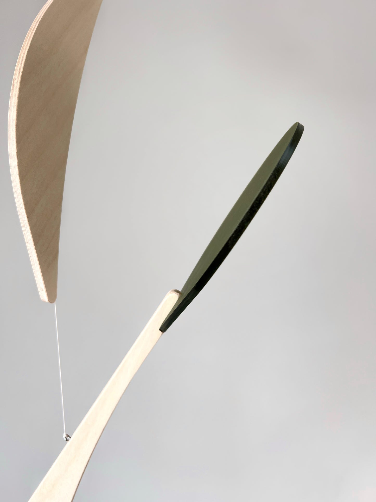 Modern Kinetic Mobile Art - Wall Hanging Relaxing Decor for Scandinavian Home Design, Office Spaces, Waiting Rooms & Minimalist Yoga Studio
Introducing Vine, a kinetic mobile inspired by the graceful climb of vines. This sleek, tall & slender mobile brings movement and calm to any space, whether it's a mid-century modern living room, a yoga studio or an office.