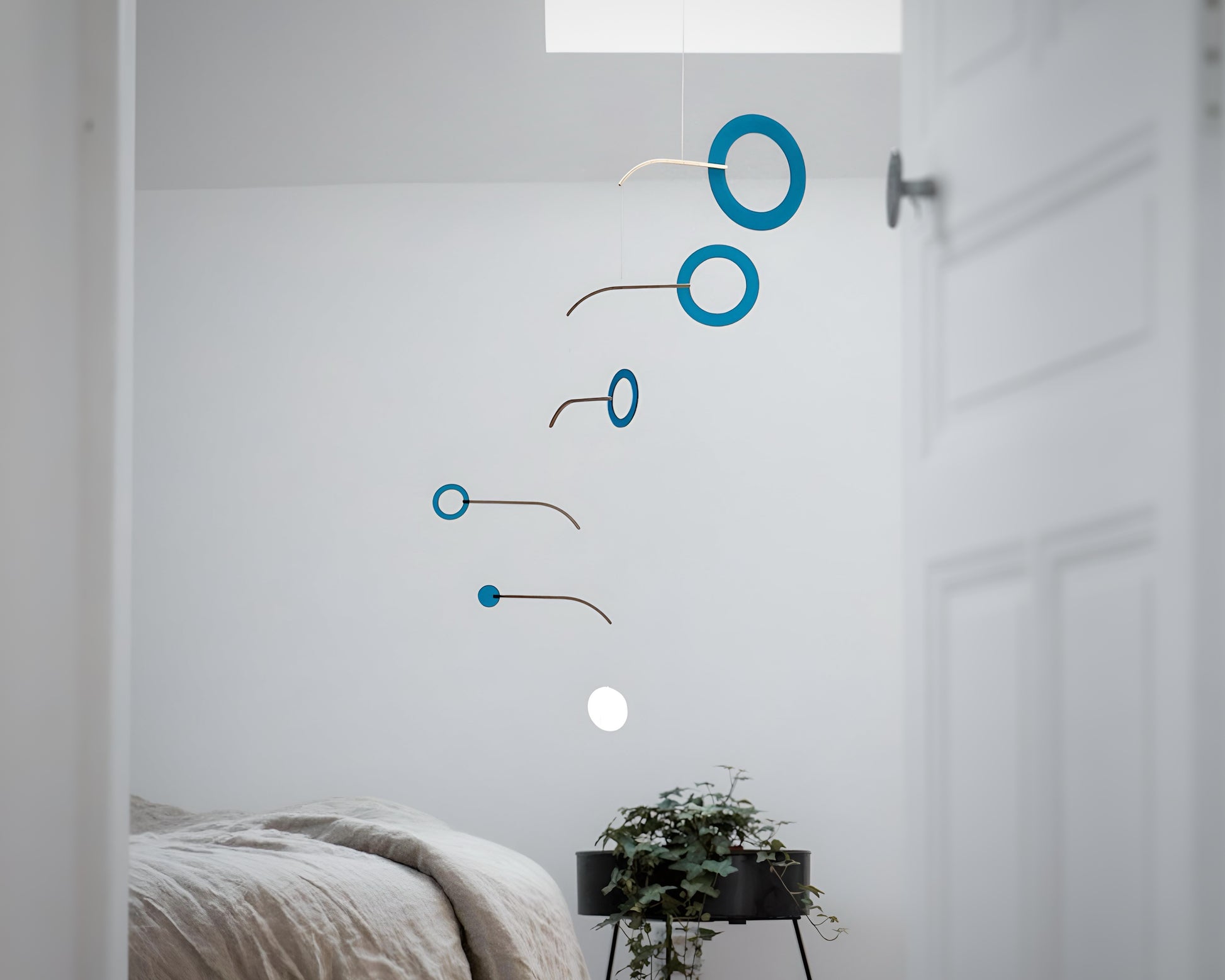 Teal Kinetic Hanging Mobile Sculpture, Minimalistic Circles Adult Mobile Home Decor - Halo Halo Handcrafted By The Illuminist
Introducing Halo Halo Mobile - A stunning piece of kinetic art that will bring movement and interest to any room.