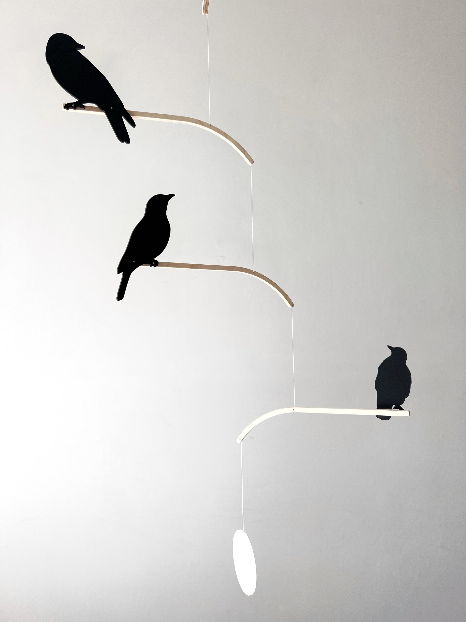 Nosey Bird Kinetic Mobile Sculpture, Adult & Baby Mobile. Hanging Silhouette Wall Art, Counterbalanced Handcrafted Acrylic & Wood Bird Mobile
Introducing ‘Nosey Birds’ - A fun piece of kinetic art that will bring movement and interest to any room. Handcrafted from responsibly sourced engineered birch, this unique mobile features 5 laser cut bird silhouettes of increasing size in a stunning frosted black acrylic. Composed so the birds are looking towards each other while perched on the curved birch arm.