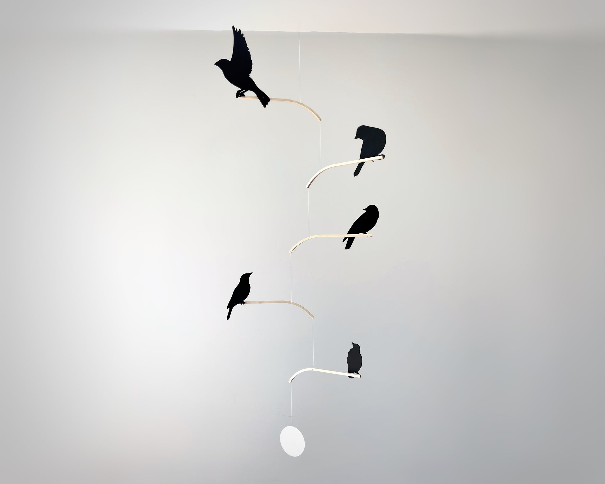 Nosey Bird Kinetic Mobile Sculpture, Adult & Baby Mobile. Hanging Silhouette Wall Art, Counterbalanced Handcrafted Acrylic & Wood Bird Mobile
Introducing ‘Nosey Birds’ - A fun piece of kinetic art that will bring movement and interest to any room. Handcrafted from responsibly sourced engineered birch, this unique mobile features 5 laser cut bird silhouettes of increasing size in a stunning frosted black acrylic. Composed so the birds are looking towards each other while perched on the curved birch arm.