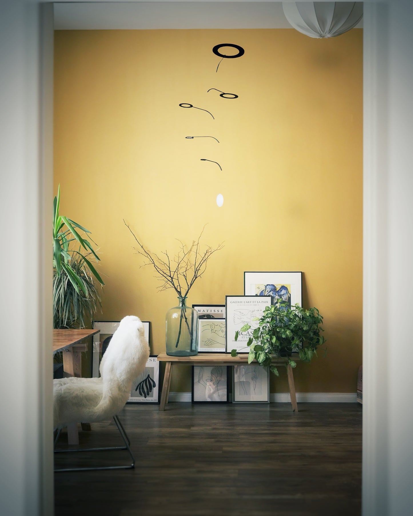 Large Kinetic Mobile Sculpture, Black Hanging Adult Mobile, Mid Century Modern Art Mobile, Calder Minimal Circle Mobile, Halo The Illuminist
Introducing Halo Mobile - A stunning piece of kinetic art that will bring movement and joy to any room. Handcrafted from responsibly sourced engineered birch, this unique mobile features six halo rings of increasing width and size in frosted black acrylic.