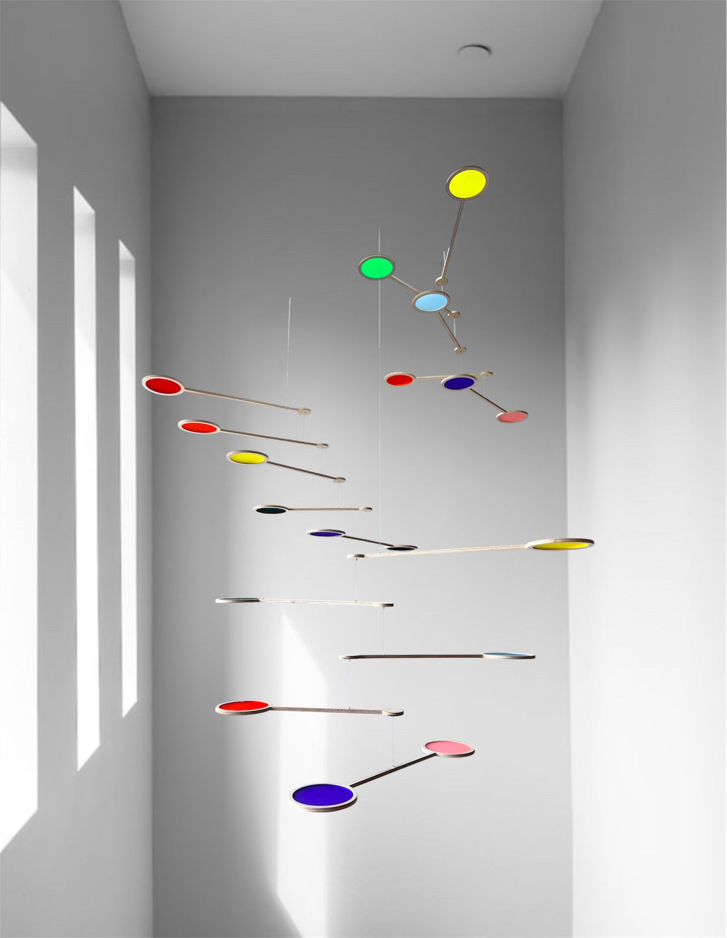 Tripple Orbit Mobile - Add bold colour, movement, and modern style to your home with the Large Tripple Orbit Mobile – a handcrafted hanging decoration made from premium plywood and vibrant acrylic discs. This kinetic ceiling sculpture is perfect for adding a contemporary home accessory to your space, blending mid-century modern, minimalist, and art-inspired decor aesthetics.