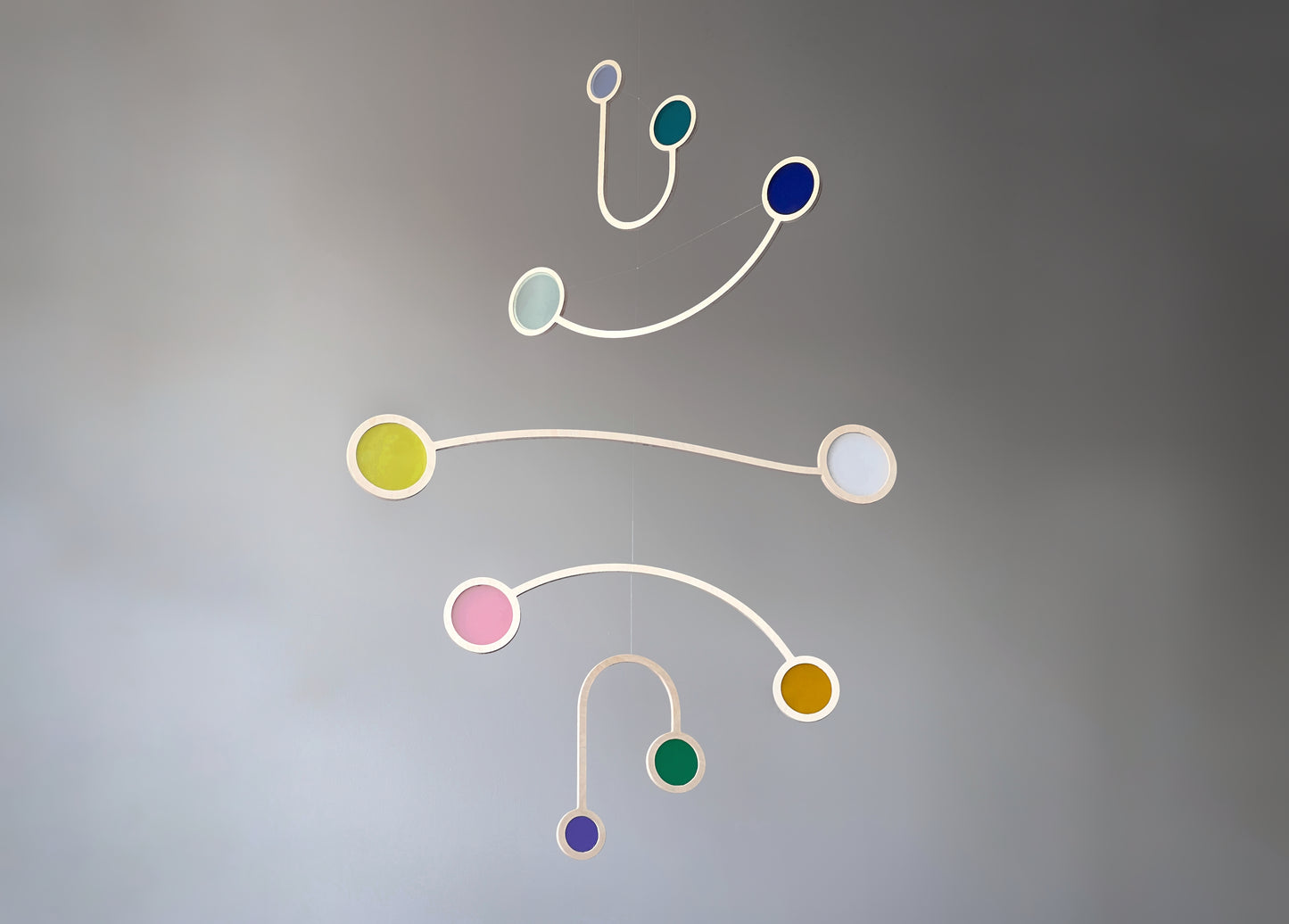 Wooden Hanging Kinetic Mobile Sculpture. Adult & Baby Mobile. Custom Colour Mid Century Calder Mobile, Scandi Nursery Home Decor. Supernova Mobile.
Wooden and colourful acrylic mobile. Influenced by Calder mobiles and the mid-century modern movement. A beautiful piece of moving handmade hanging art.
An ideal fit for an infant’s room, a stairwell, Home Office, Living-room, dorm room or in a feature window - What a perfect gift.
