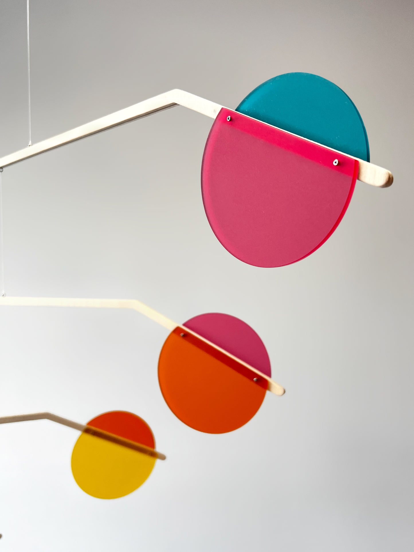 Matt Retro Rainbow Kinetic Mobile Sculpture Mid Century Modern Art, Adult & Baby Mobile. Matt Acrylic Abstract Art Hanging Mobile - Prism The Illuminist
A Wooden and colourful matt acrylic mobile. Influenced by Calder mobiles and the mid-century modern movement. A beautiful piece of cantilever hanging art.