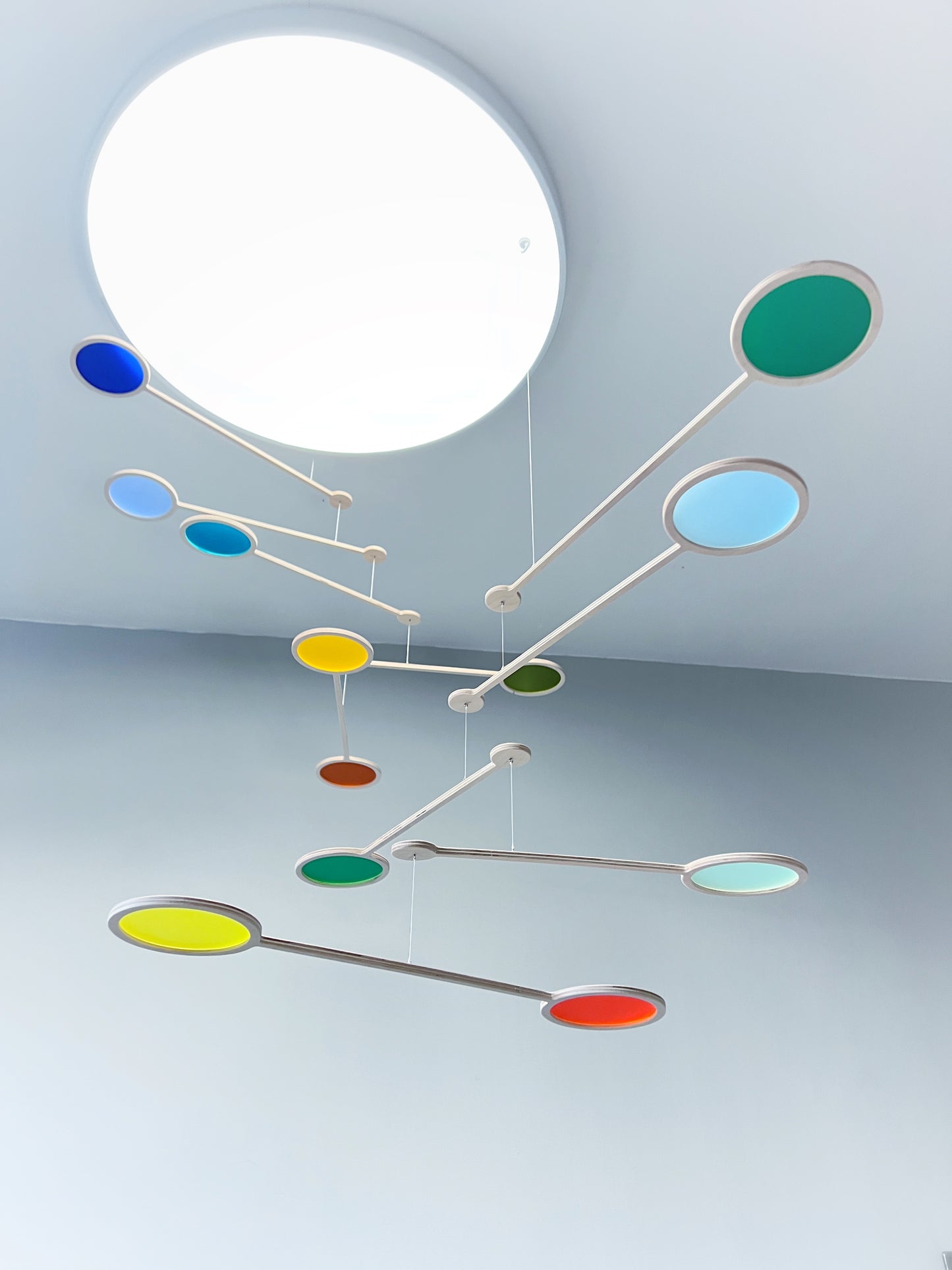 Large Kinetic Custom Mobile Sculpture. Mid Century Modern Calder Bespoke Hanging Art. Adult & Baby Nursery Mobile, Colourful Orbit - Choose your own colours mobile
Wooden and colourful acrylic mobile. Influenced by Calder mobiles and the mid-century modern movement. A beautiful piece of moving hanging art.
Double form orbit mobile at tiered height, hanging from 2 strings, creating one kinetic form.
Both Orbit mobiles together hang approximately 80cm from the ceiling at their lowest point. Singular Orbi