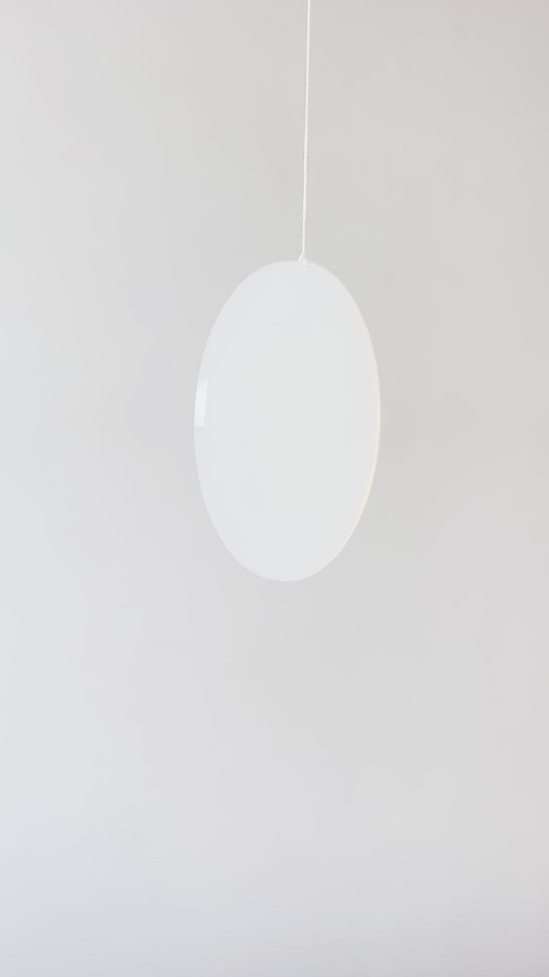 Large Kinetic Mobile Sculpture, Black Hanging Adult Mobile, Mid Century Modern Art Mobile, Calder Minimal Circle Mobile, Halo The Illuminist
Introducing Halo Mobile - A stunning piece of kinetic art that will bring movement and joy to any room. Handcrafted from responsibly sourced engineered birch, this unique mobile features six halo rings of increasing width and size in frosted black acrylic.