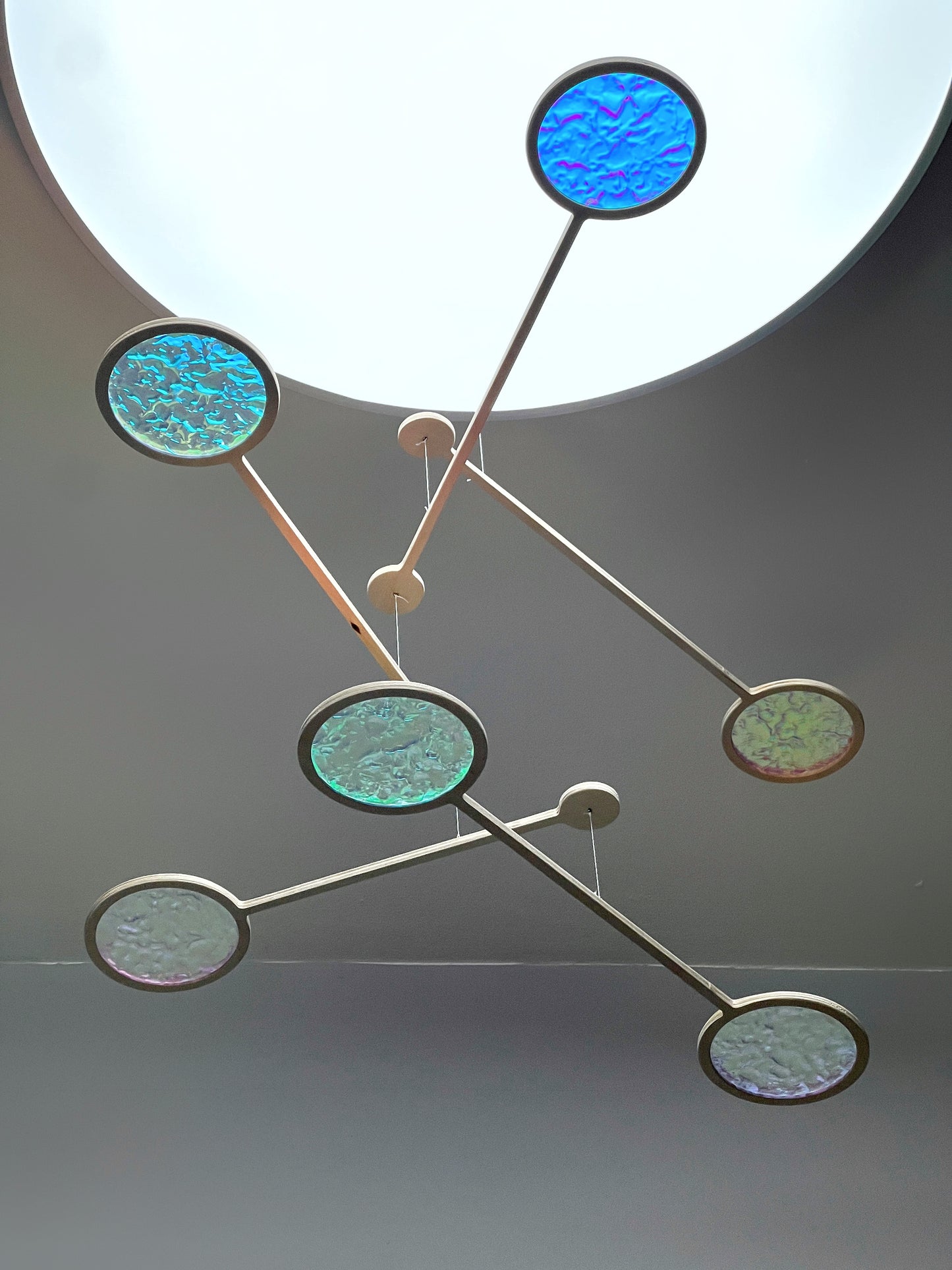 Orbit Iridescent Diachronic Mobile - The Illuminist - Mobiles Kinetic Mobile Kinetic Art Kinetic Sculpture Crib Mobile Baby Mobile Nursery Mobile Mobile Art Mid Century Art Mid Century modern Calder mobile mobiles for adults furniture and decor Hanging Art Mobile Art spinning mobile Modern Art Contemporary Art Hanging mobile Calder-inspired