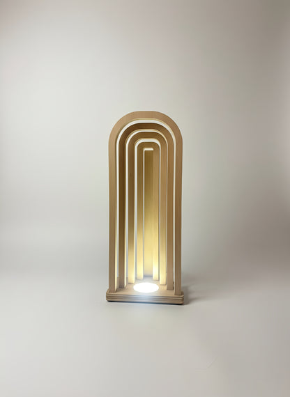 Danish Mid-Century Modern USB Arch Lamp | Dimmable Plywood Table Light | Minimalist Wooden Mood Lighting | 43cm Tall Desk Bedside Lamp

Mid-Century Modern Arch USB Table Lamp

Elevate your home decor with my signature 43cm tall Wooden Arch Lamp, designed and crafted by me, The Illuminist. A perfect example of Danish Mid-Century Modern design. This minimalist geometric piece is the ideal ambient light source for your living room sideboard, bedroom nightstand, or office desk.

ULTIMATE FUNCTIONALITY & VERSATI
