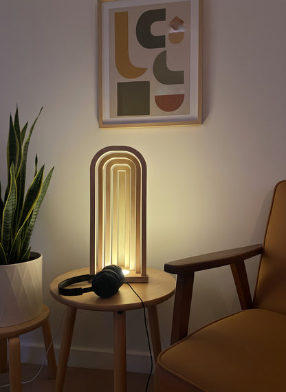Danish Mid-Century Modern USB Arch Lamp | Dimmable Plywood Table Light | Minimalist Wooden Mood Lighting | 43cm Tall Desk Bedside Lamp

Mid-Century Modern Arch USB Table Lamp

Elevate your home decor with my signature 43cm tall Wooden Arch Lamp, designed and crafted by me, The Illuminist. A perfect example of Danish Mid-Century Modern design. This minimalist geometric piece is the ideal ambient light source for your living room sideboard, bedroom nightstand, or office desk.

ULTIMATE FUNCTIONALITY & VERSATI