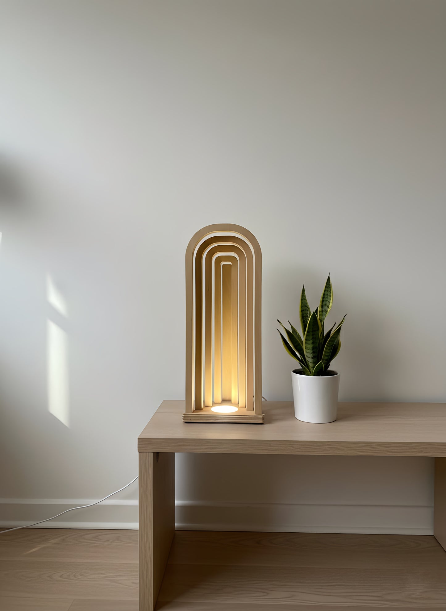 Danish Mid-Century Modern USB Arch Lamp | Dimmable Plywood Table Light | Minimalist Wooden Mood Lighting | 43cm Tall Desk Bedside Lamp

Mid-Century Modern Arch USB Table Lamp

Elevate your home decor with my signature 43cm tall Wooden Arch Lamp, designed and crafted by me, The Illuminist. A perfect example of Danish Mid-Century Modern design. This minimalist geometric piece is the ideal ambient light source for your living room sideboard, bedroom nightstand, or office desk.

ULTIMATE FUNCTIONALITY & VERSATI