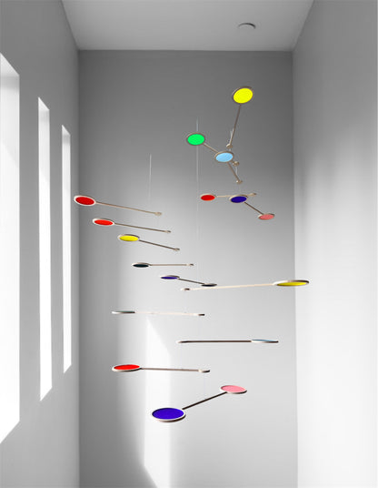 Tripple Orbit Mobile - Add bold colour, movement, and modern style to your home with the Large Tripple Orbit Mobile – a handcrafted hanging decoration made from premium plywood and vibrant acrylic discs. This kinetic ceiling sculpture is perfect for adding a contemporary home accessory to your space, blending mid-century modern, minimalist, and art-inspired decor aesthetics.