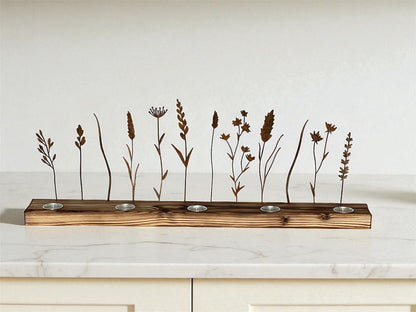 Metal wildflower silhouettes designed to create shadow art with flickering tea light candles