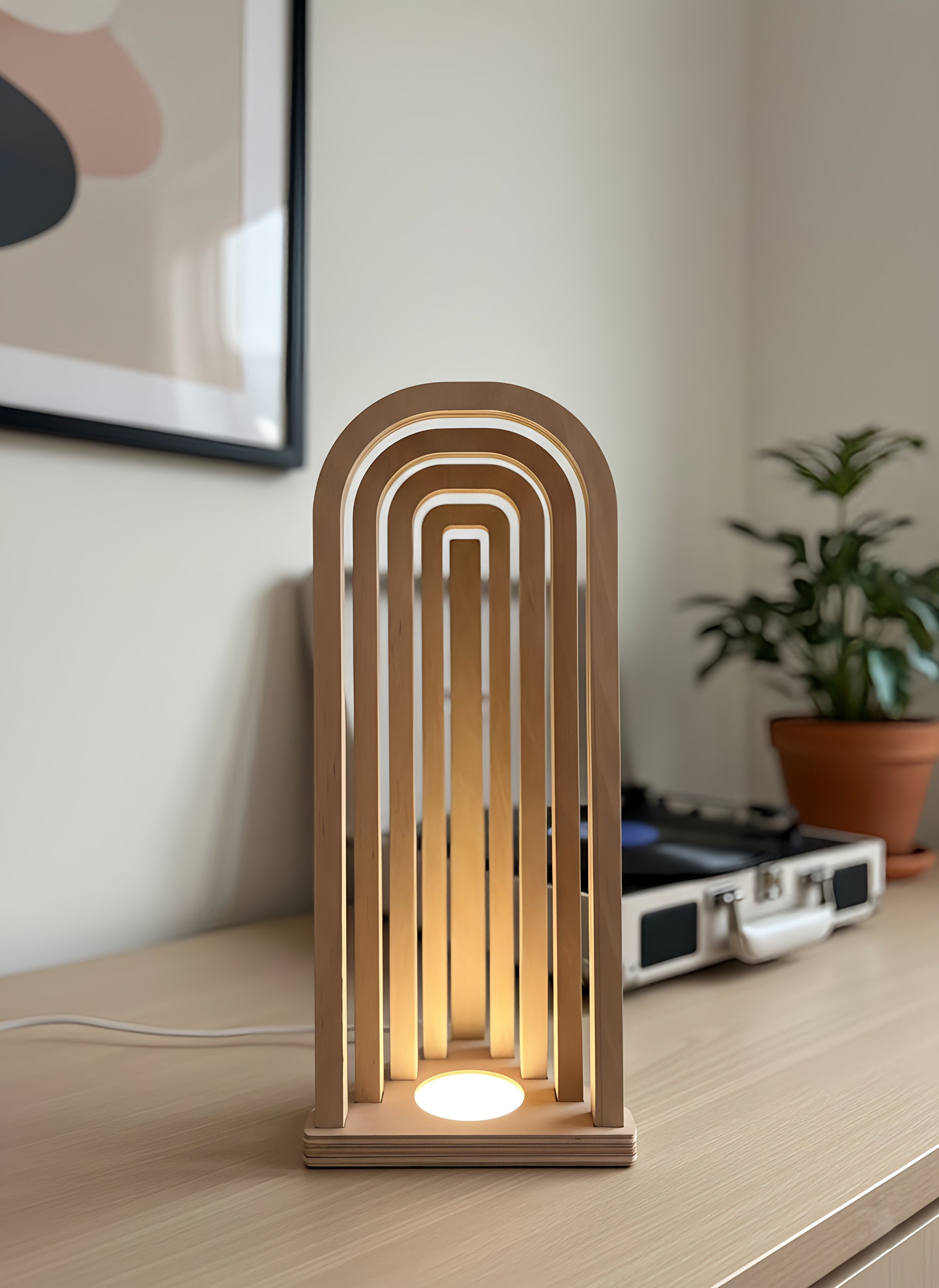 Danish Mid-Century Modern USB Arch Lamp | Dimmable Plywood Table Light | Minimalist Wooden Mood Lighting | 43cm Tall Desk Bedside Lamp

Mid-Century Modern Arch USB Table Lamp

Elevate your home decor with my signature 43cm tall Wooden Arch Lamp, designed and crafted by me, The Illuminist. A perfect example of Danish Mid-Century Modern design. This minimalist geometric piece is the ideal ambient light source for your living room sideboard, bedroom nightstand, or office desk.

ULTIMATE FUNCTIONALITY & VERSATI