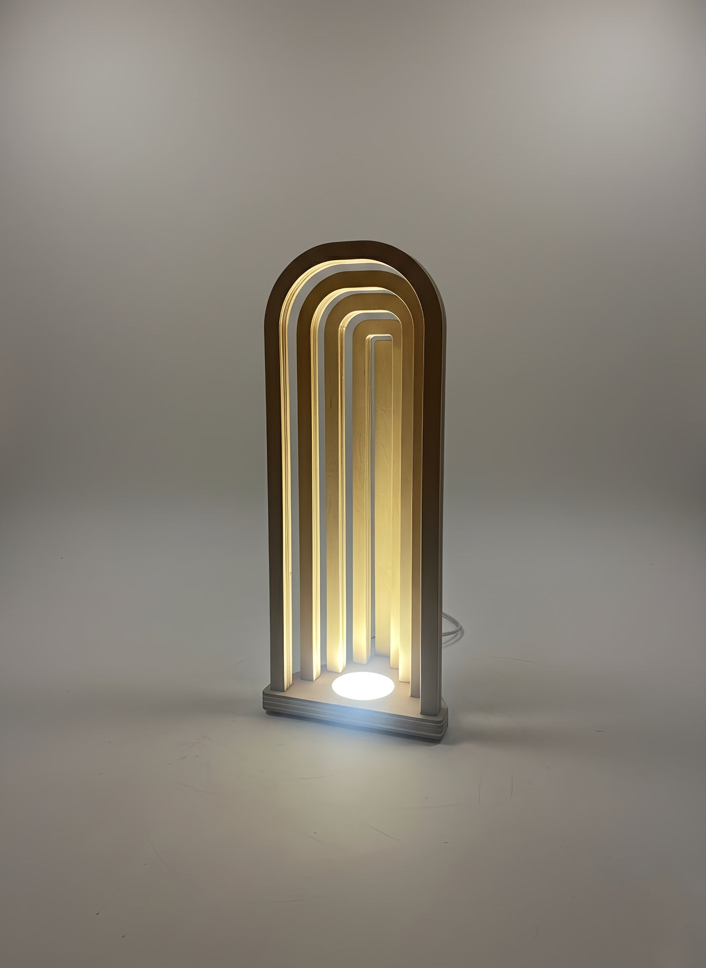 Danish Mid-Century Modern USB Arch Lamp | Dimmable Plywood Table Light | Minimalist Wooden Mood Lighting | 43cm Tall Desk Bedside Lamp

Mid-Century Modern Arch USB Table Lamp

Elevate your home decor with my signature 43cm tall Wooden Arch Lamp, designed and crafted by me, The Illuminist. A perfect example of Danish Mid-Century Modern design. This minimalist geometric piece is the ideal ambient light source for your living room sideboard, bedroom nightstand, or office desk.

ULTIMATE FUNCTIONALITY & VERSATI