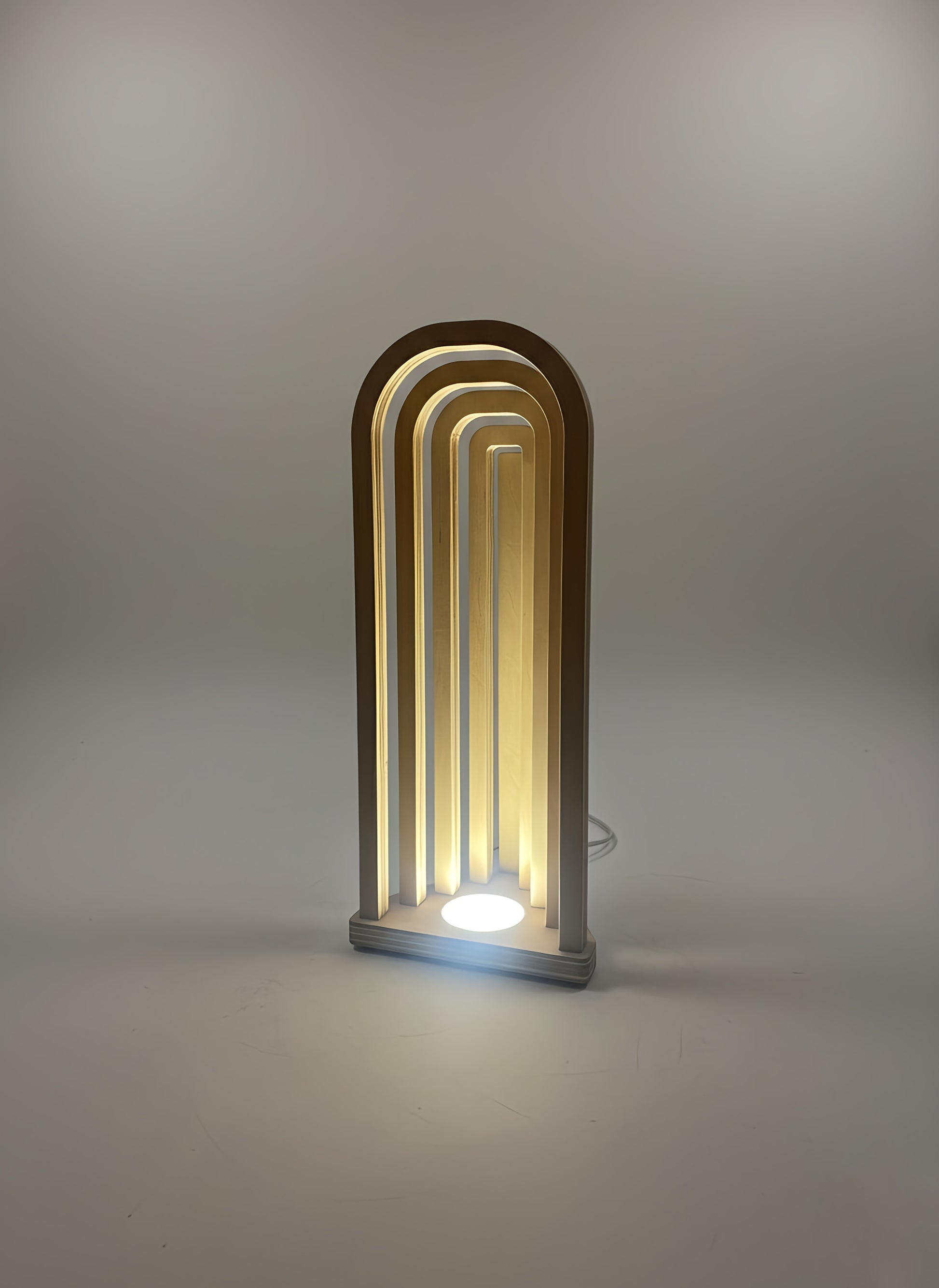 Danish Mid-Century Modern USB Arch Lamp | Dimmable Plywood Table Light | Minimalist Wooden Mood Lighting | 43cm Tall Desk Bedside Lamp

Mid-Century Modern Arch USB Table Lamp

Elevate your home decor with my signature 43cm tall Wooden Arch Lamp, designed and crafted by me, The Illuminist. A perfect example of Danish Mid-Century Modern design. This minimalist geometric piece is the ideal ambient light source for your living room sideboard, bedroom nightstand, or office desk.

ULTIMATE FUNCTIONALITY & VERSATI