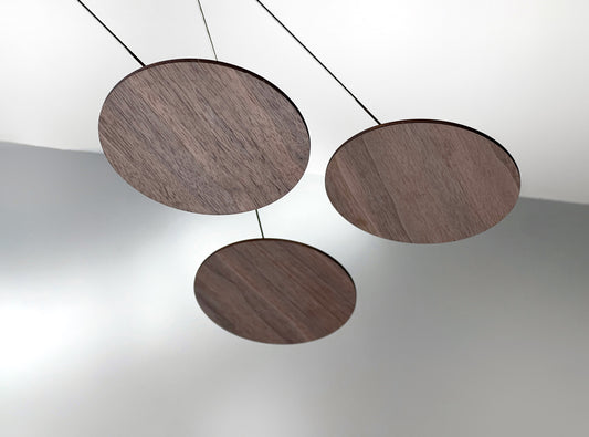 A handcrafted wooden mobile — a modern mobile, inspired by Alexander Calders’ mobile kinetic sculptures for mid century decor lovers. This elegant hanging mobile is a piece of moving art and a mobile for adults, bringing calm motion, balance, and timeless design to your home.

This mid century mobile is a beautifully balanced kinetic mobile, art mobile, and large mobile that drifts gracefully with the air. Handcrafted from fine walnut veneer and stainless steel wire, it combines organic warmth with minimali
