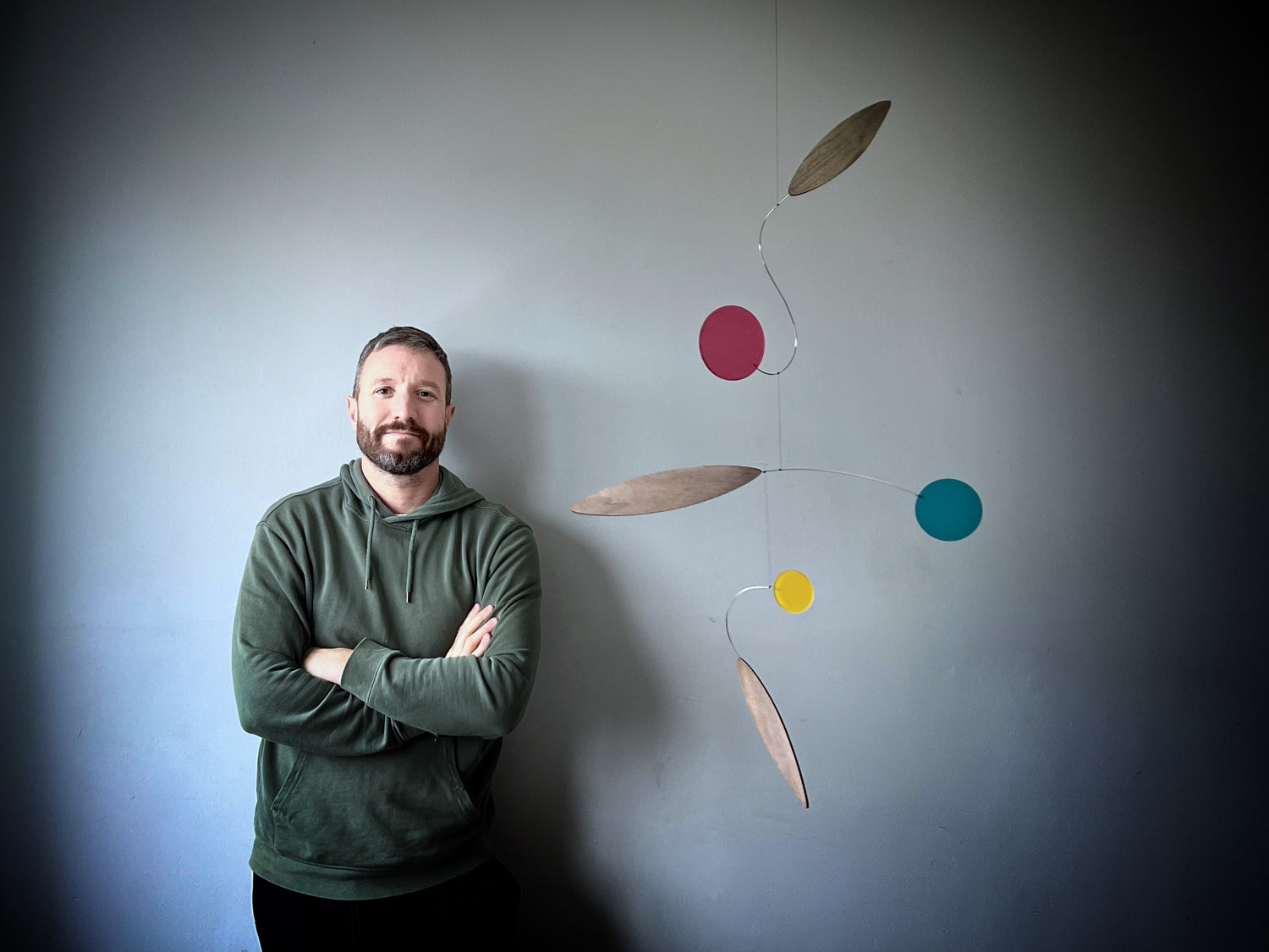 Modern kinetic hanging mobile sculpture made from handcrafted acrylic and wood elements, contemporary art mobile with balanced geometric shapes, mid-century inspired ceiling decor, handmade kinetic art for home interiors, designer hanging sculpture for nursery or living room, lightweight floating abstract mobile, handcrafted modern décor, minimalist kinetic artwork, luxury handmade UK mobile by The Illuminist.