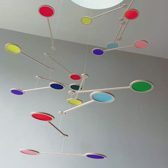 Tripple Orbit Mobile - Add bold colour, movement, and modern style to your home with the Large Tripple Orbit Mobile – a handcrafted hanging decoration made from premium plywood and vibrant acrylic discs. This kinetic ceiling sculpture is perfect for adding a contemporary home accessory to your space, blending mid-century modern, minimalist, and art-inspired decor aesthetics.