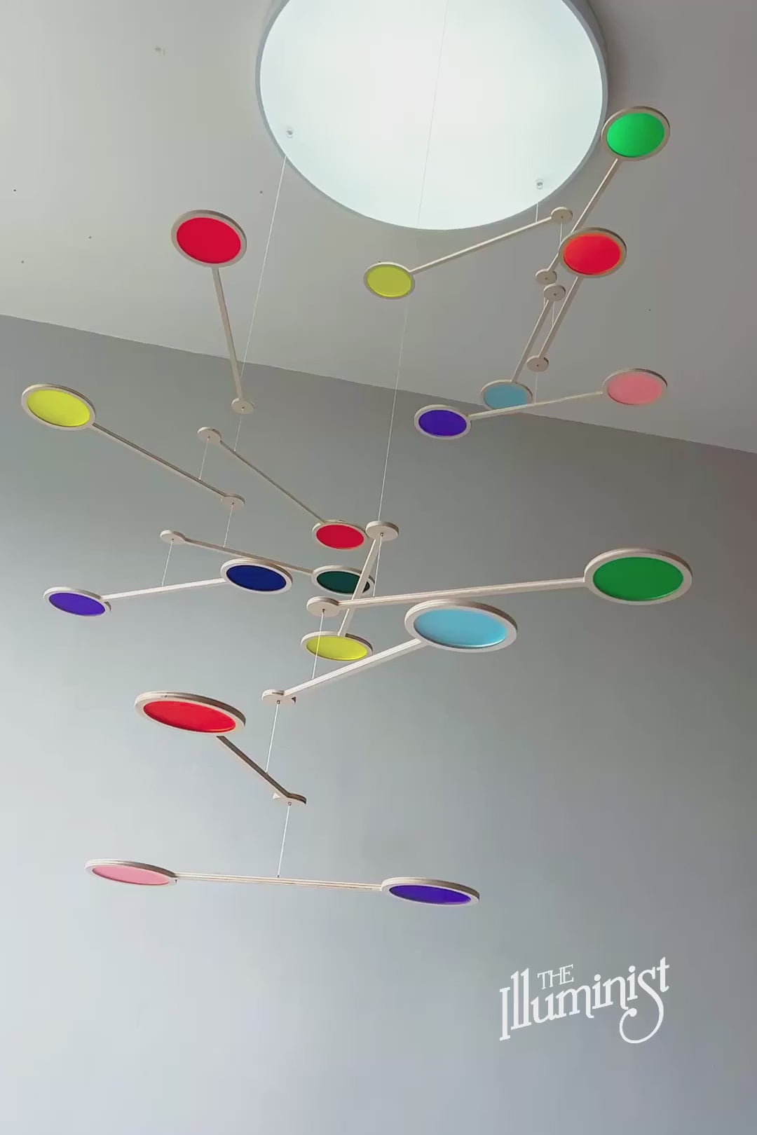 Load video: Tripple Orbit Mobile - Add bold colour, movement, and modern style to your home with the Large Tripple Orbit Mobile – a handcrafted hanging decoration made from premium plywood and vibrant acrylic discs. This kinetic ceiling sculpture is perfect for adding a contemporary home accessory to your space, blending mid-century modern, minimalist, and art-inspired decor aesthetics.